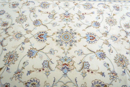 Central medallion detail of New Mashad rug from Iran / Persia