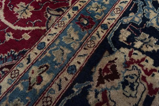 Close-up detail of 2000s Mashad rug from Iran / Persia showing Wool weave