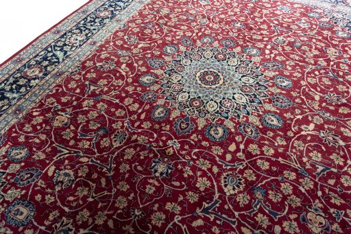 Backside of handmade 2000s Mashad rug showing knot structure and weave density