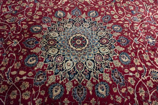 Central medallion detail of 2000s Mashad rug from Iran / Persia