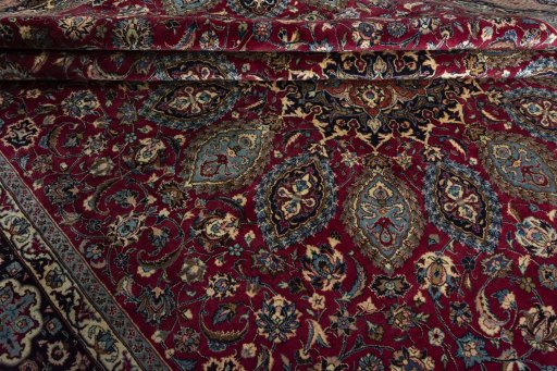 Close-up detail of 2000s Mashad rug from Iran / Persia showing Wool weave