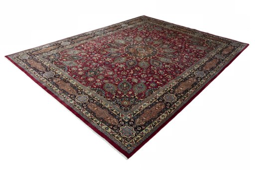 Corner detail of 2000s Mashad rug showing border pattern and Wool pile