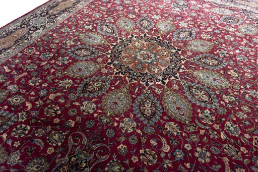 Backside of handmade 2000s Mashad rug showing knot structure and weave density