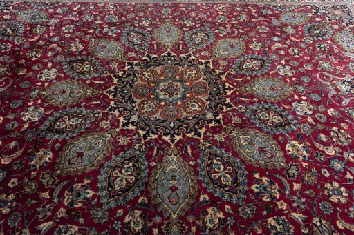 Central medallion detail of 2000s Mashad rug from Iran / Persia