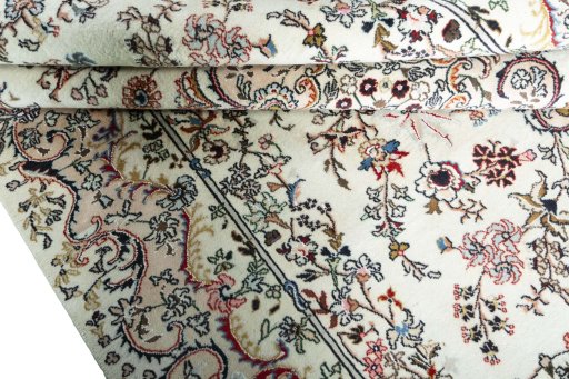 Close-up detail of New Mashad rug from Iran / Persia showing Wool weave