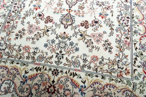 Close-up detail of New Mashad rug from Iran / Persia showing Wool weave