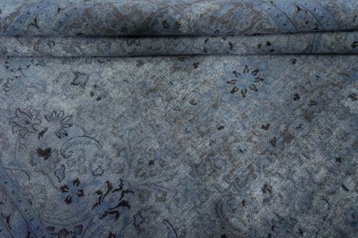 Close-up detail of 1950s Mashad rug from Iran / Persia showing Wool weave