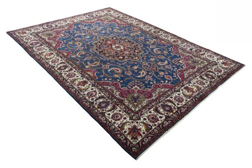 Close-up detail of 2000s Mashad rug from Iran / Persia showing Wool weave