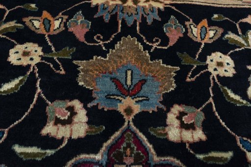 Central medallion detail of 1970s Mashad rug from Iran / Persia