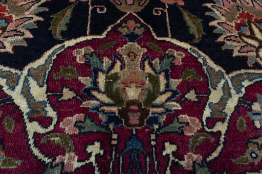 Close-up detail of 1970s Mashad rug from Iran / Persia showing Wool weave