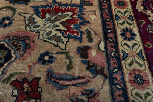 Corner detail of 1970s Mashad rug showing border pattern and Wool pile