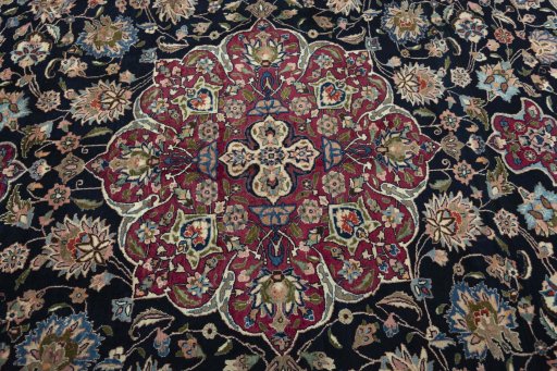 Central medallion detail of 1970s Mashad rug from Iran / Persia