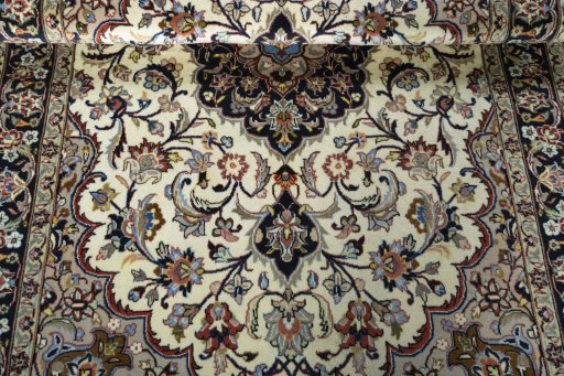 Close-up detail of 2000s Mashad rug from Iran / Persia showing Wool weave