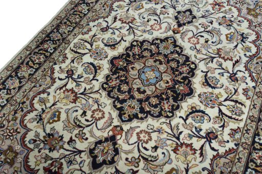 Backside of handmade 2000s Mashad rug showing knot structure and weave density