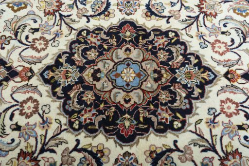 Central medallion detail of 2000s Mashad rug from Iran / Persia