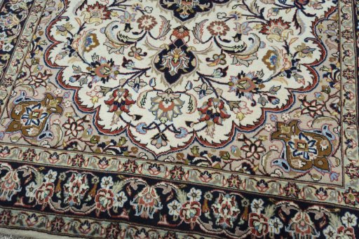 Close-up detail of 2000s Mashad rug from Iran / Persia showing Wool weave