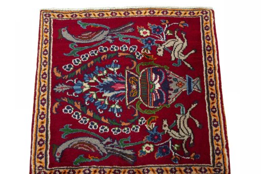 Surface texture of 2000s Mashad rug with natural Wool and intricate pattern