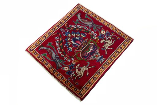 Corner detail of 2000s Mashad rug showing border pattern and Wool pile