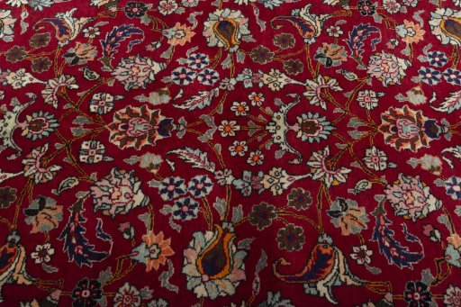 Central medallion detail of 2000s Mashad rug from Iran / Persia