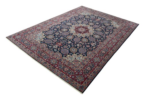 Corner detail of 1970s Mashad rug showing border pattern and Wool pile