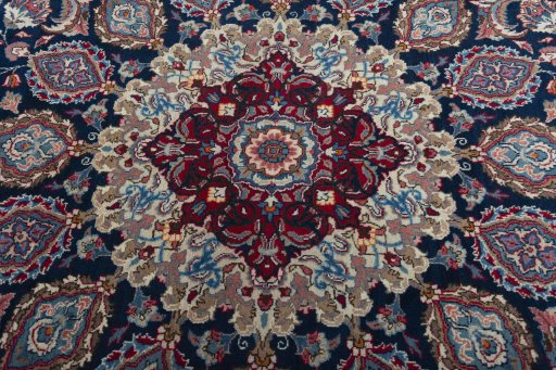 Central medallion detail of 1970s Mashad rug from Iran / Persia