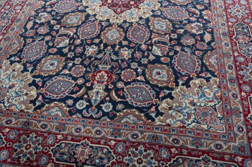 Close-up detail of 1970s Mashad rug from Iran / Persia showing Wool weave