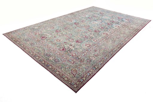 Corner detail of 1950s Mashad rug showing border pattern and Wool pile