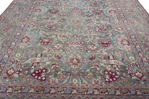 Central medallion detail of 1950s Mashad rug from Iran / Persia