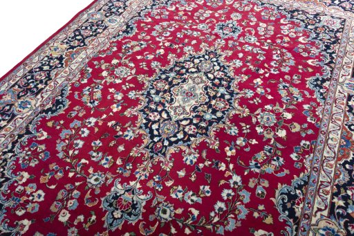 Backside of handmade 2000s Mashad rug showing knot structure and weave density
