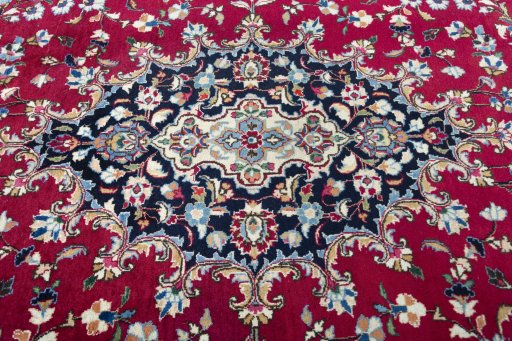 Central medallion detail of 2000s Mashad rug from Iran / Persia