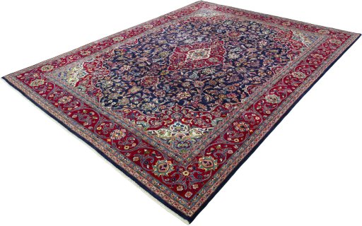 Corner detail of 2000s Mashad rug showing border pattern and Wool pile