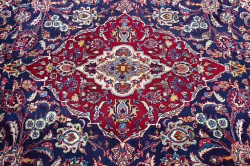Central medallion detail of 2000s Mashad rug from Iran / Persia