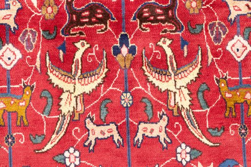 Corner detail of 1990s Mashad rug showing border pattern and Wool pile