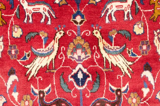 Full view of 1990s Mashad rug from Iran / Persia, 292 × 102 cm in Red tones