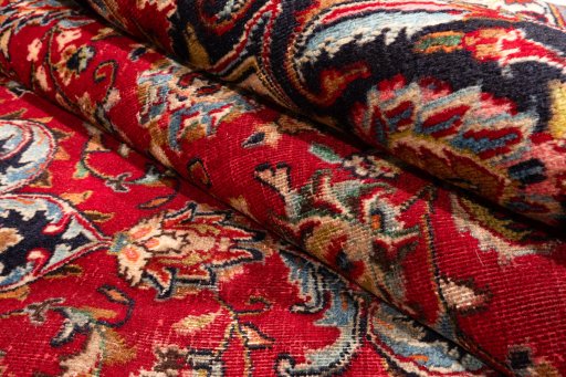 Central medallion detail of 2000s Mashad rug from Iran / Persia