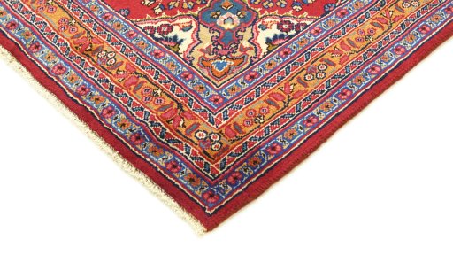 Backside of handmade 2000s Mashad rug showing knot structure and weave density