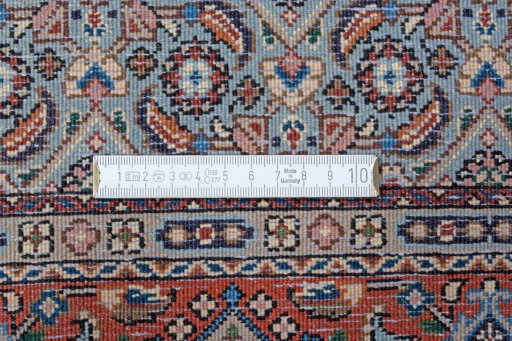 Backside of handmade New Moud rug showing knot structure and weave density