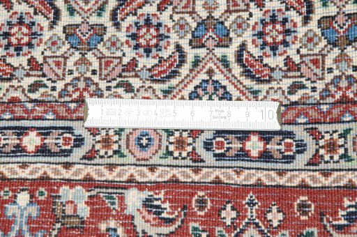 Backside of handmade New Moud rug showing knot structure and weave density