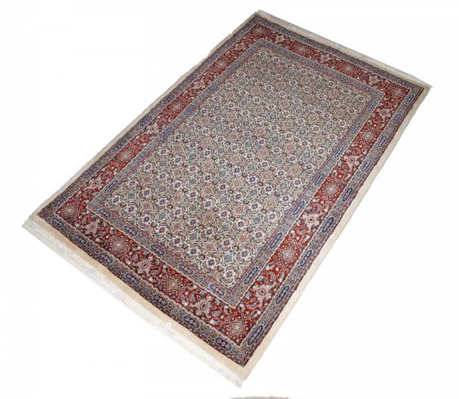 Close-up detail of New Moud rug from Iran / Persia showing Wool weave