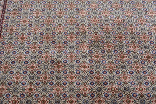 Surface texture of New Moud rug with natural Wool and intricate pattern