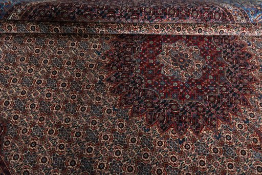 Close-up detail of New Moud rug from Iran / Persia showing Wool weave