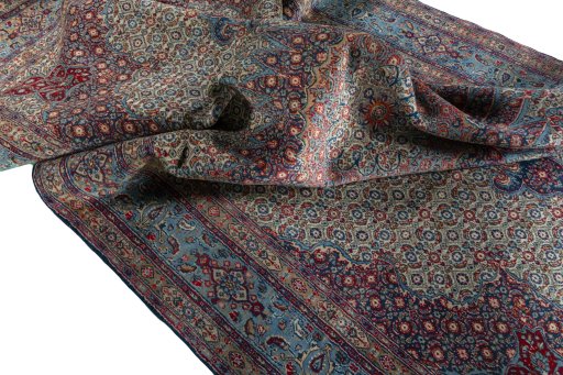 Surface texture of 2000s Moud rug with natural Wool and intricate pattern
