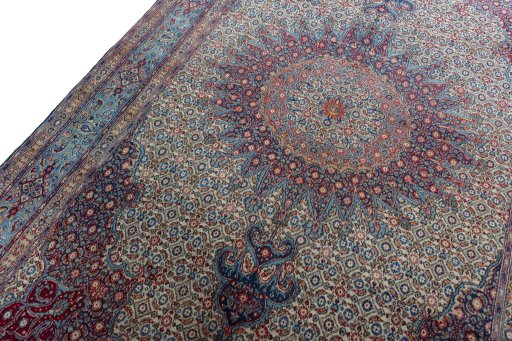 Backside of handmade 2000s Moud rug showing knot structure and weave density