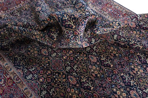 Close-up detail of 1970s Moud rug from Iran / Persia showing Wool weave
