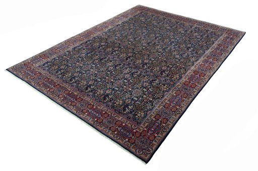 Corner detail of 1970s Moud rug showing border pattern and Wool pile