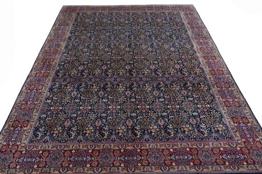 Surface texture of 1970s Moud rug with natural Wool and intricate pattern