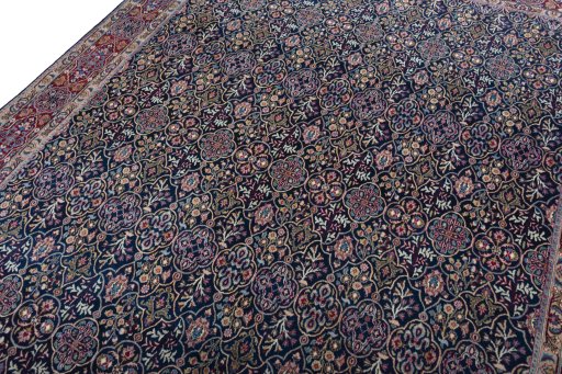 Backside of handmade 1970s Moud rug showing knot structure and weave density