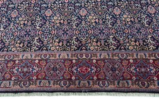Close-up detail of 1970s Moud rug from Iran / Persia showing Wool weave