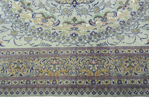 Corner detail of 2000s Moud rug showing border pattern and Wool pile