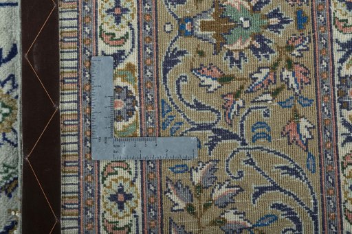 Backside of handmade 2000s Moud rug showing knot structure and weave density